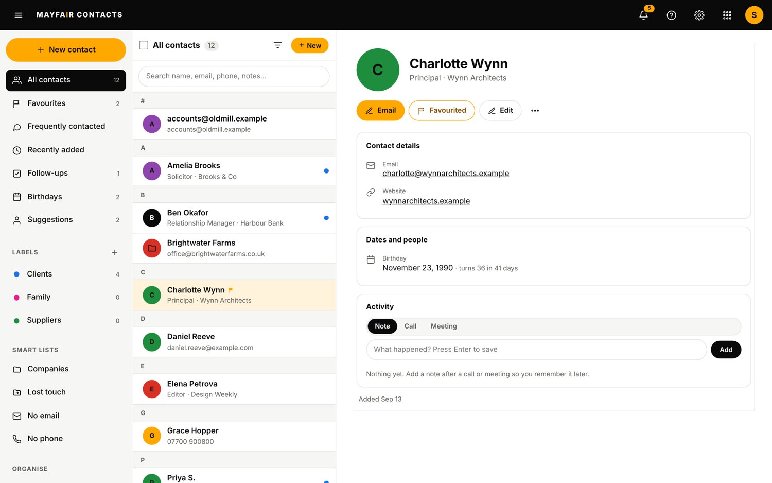 The Contacts app on a laptop, sample data