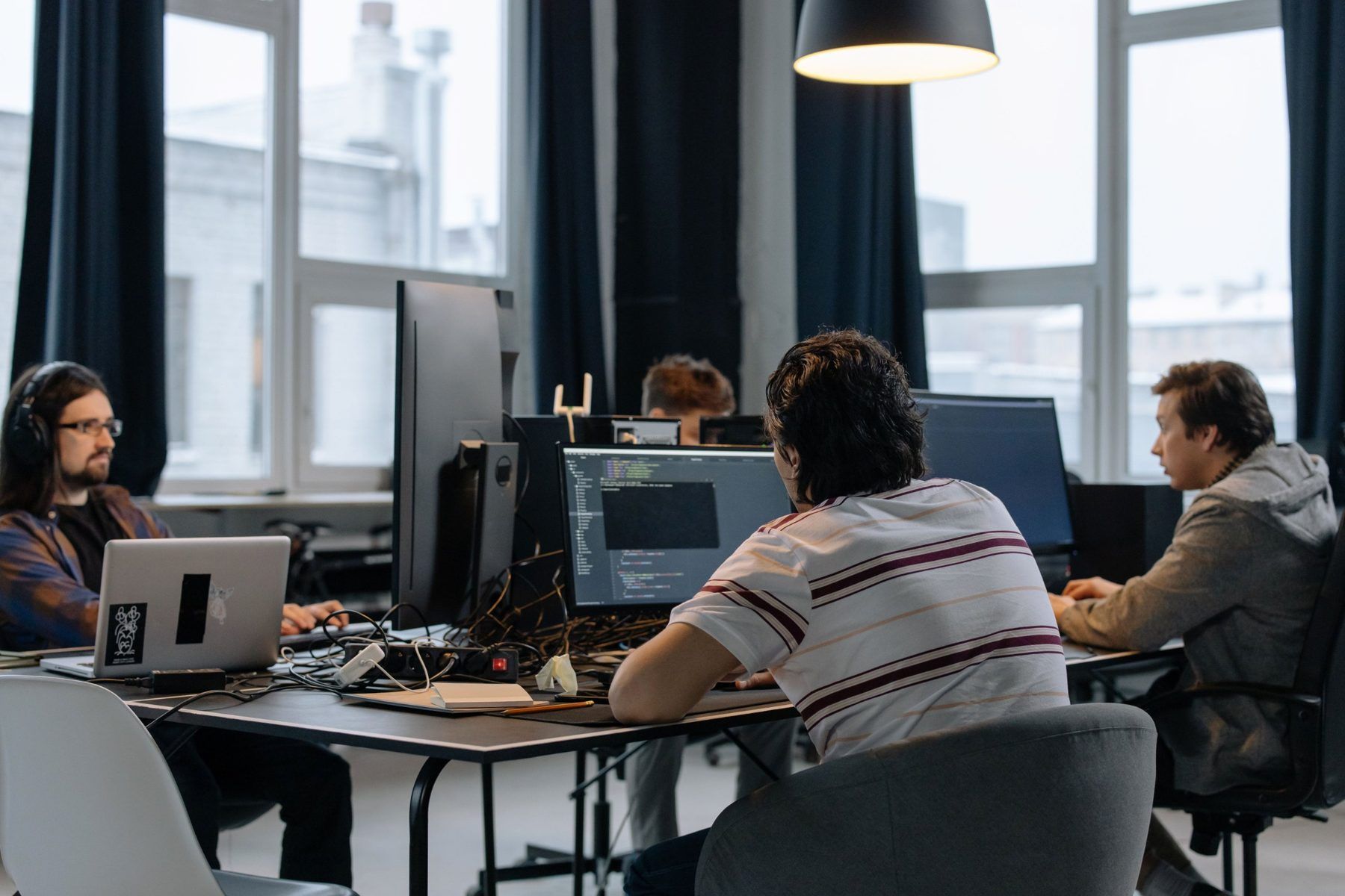 People working at computers in an open plan office